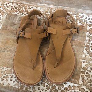 Teva T-strap sandals. Tan